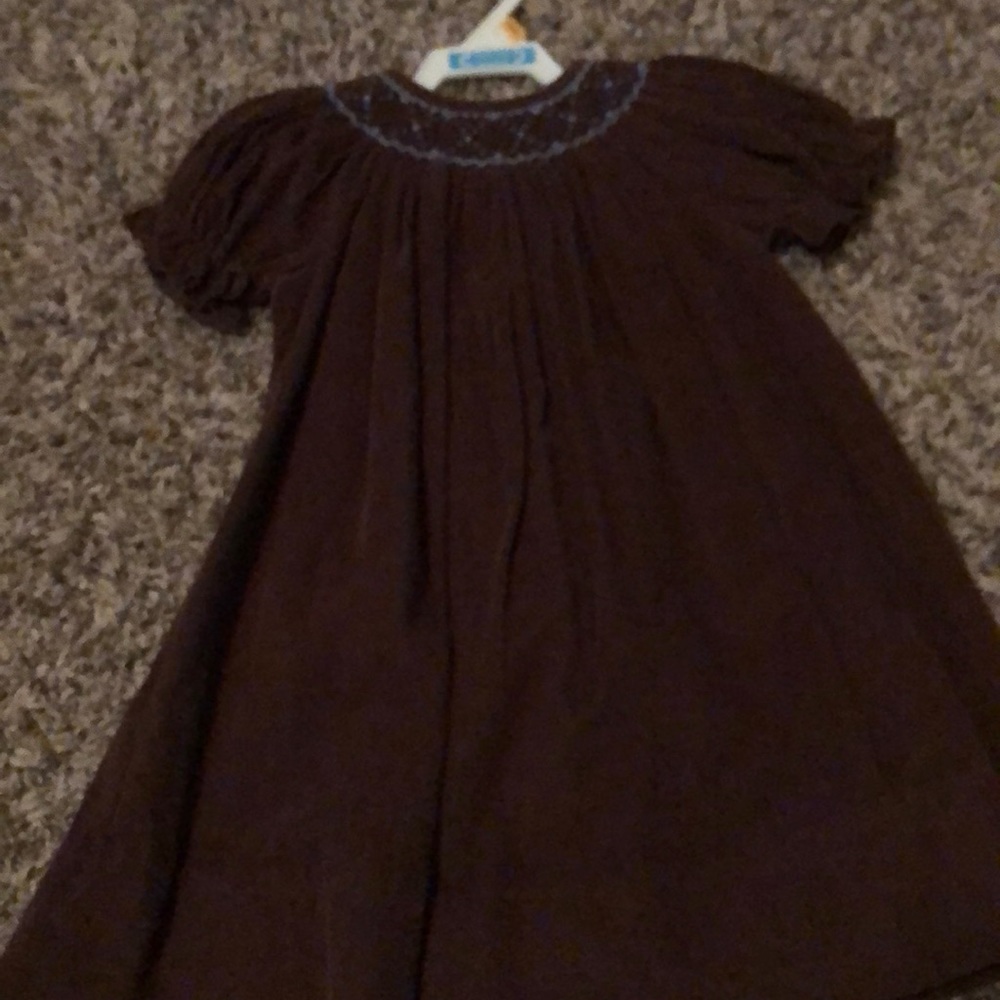 Girl’s beautiful smocked corduroy dress